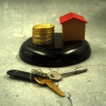A gavel with money representing legal damages
